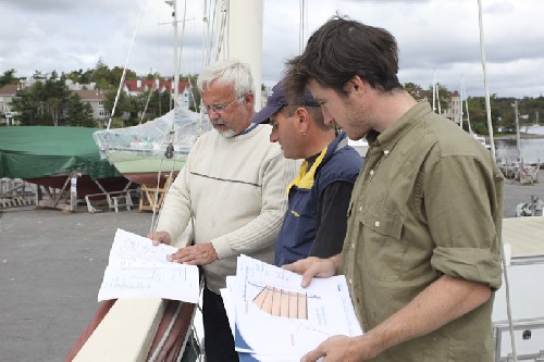 Jim, Jim and Chris deciphering what ropes go where on a junk rig yacht