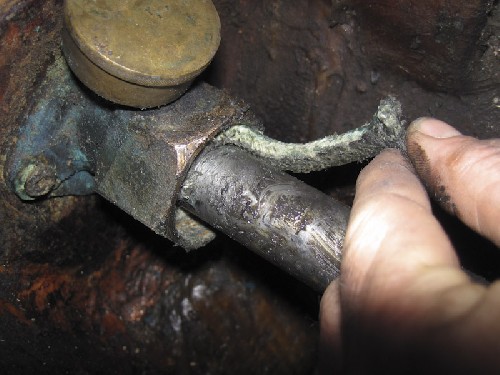 Pulling the old stuff out of the stuffing box so i can stuff some new stuff in