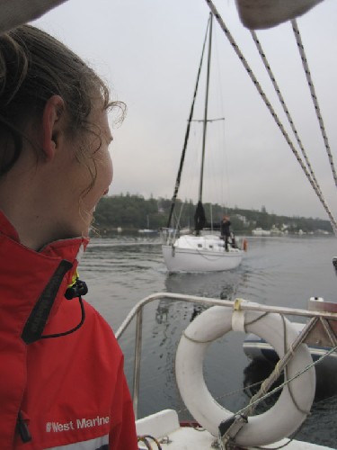 Jess looking back to our flotilla (well, one escort yacht, thanks Fred!) as she struggles to keep up with the might of our 8 hp single cylinder diesel