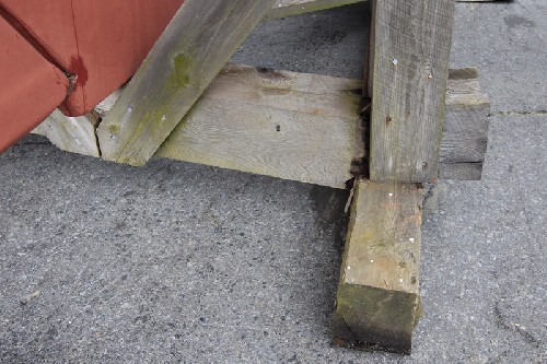 8x8 solid wooden beam sheared right through, rotten on the inside.