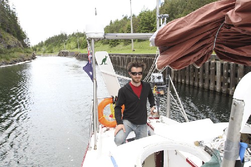 Chris steering us through St Peters Canal out of the lock.