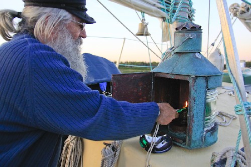 Bob from yacht Easy Go, lighting his kero nav lights! Amazing!