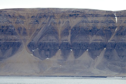 Cool erosion patterns in the cliffs as we sail past