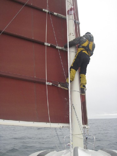 Chris climbing the batons to see potential rocks ahead