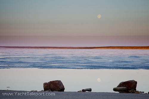 Moon and reflection over the bay