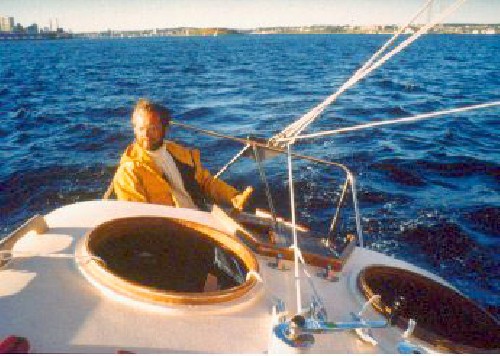 Jim Creighton at the helm, sailing Marco Polo III