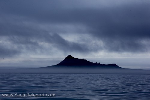 An Island appearing beneath the fog
