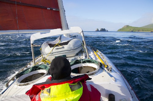Jess steering Teleport through crazy currents and whirls at 12kn