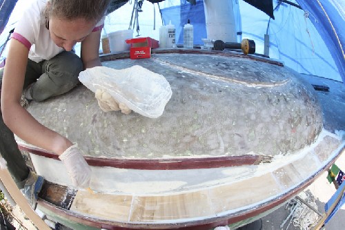 Jess putting in the new deck bits of wood, pre cut for us by Jim!