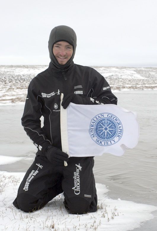 Chris with AG flag, Victoria Island 2005